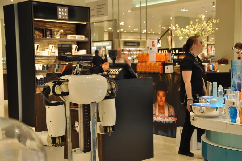 people are looking at products at the counter