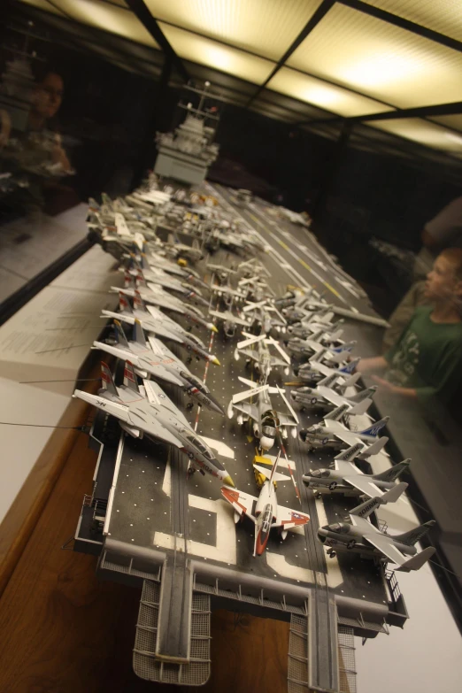 models of planes sitting on a long counter top