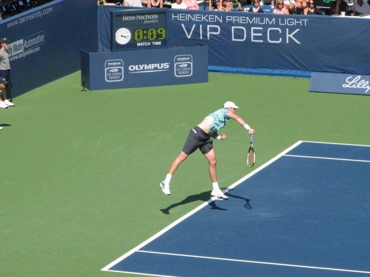 a man with a tennis racket in his hand