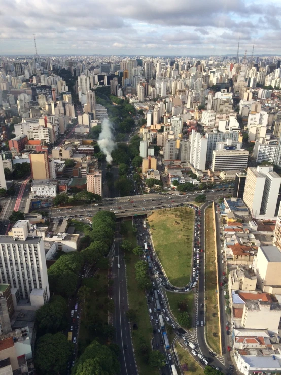 an aerial view of a city intersection with a lot of buildings