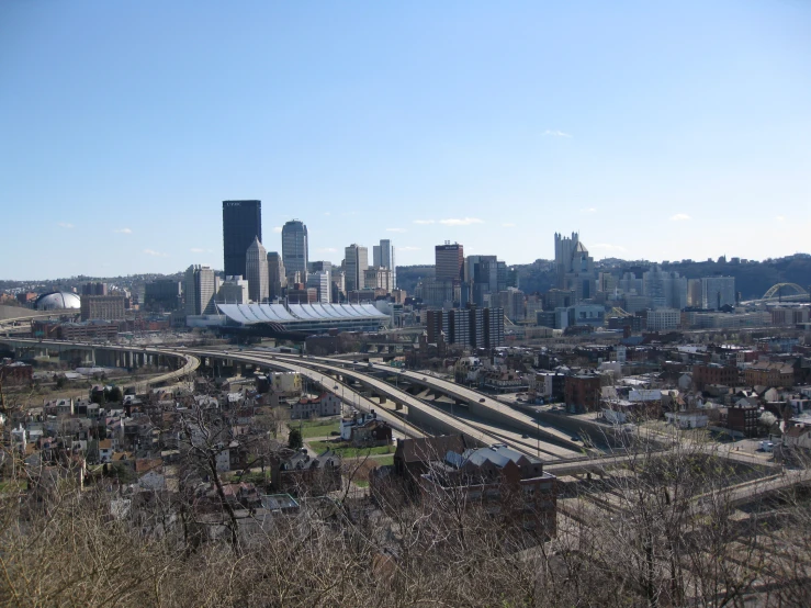 a view of a large city with lots of tall buildings