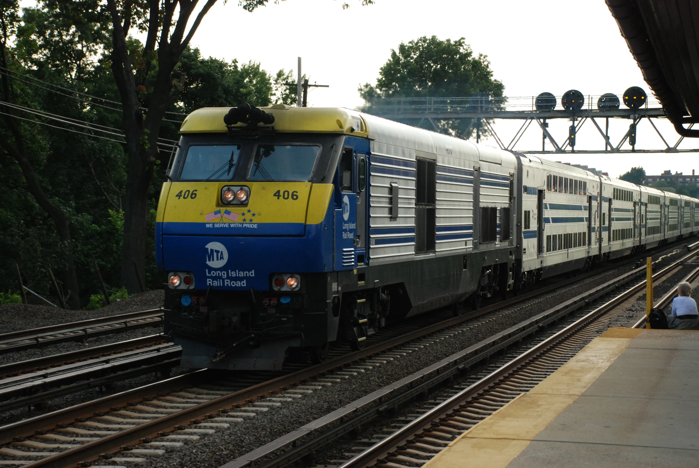 a train sitting at the side of a train station next to the platform