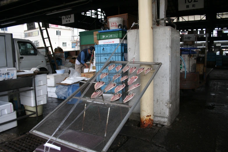 several large metal boxes stacked next to each other