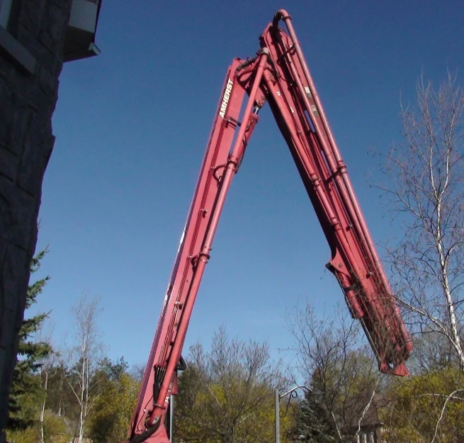 the crane is lifted up into the air by it's hook