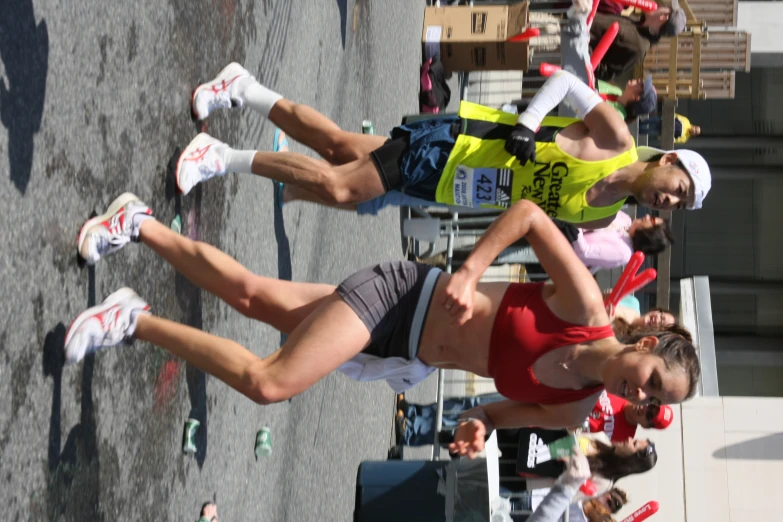 two people running together in a marathon