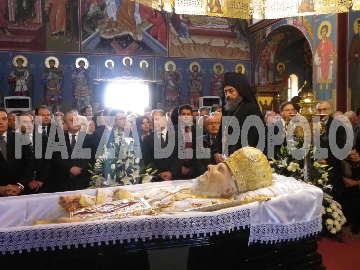 the catholic person is in a procession in a catholic church