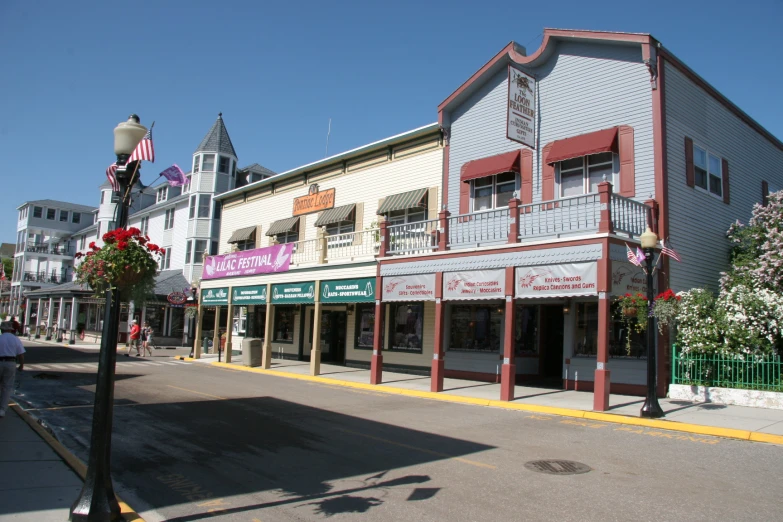 a street view with several shops and businesses