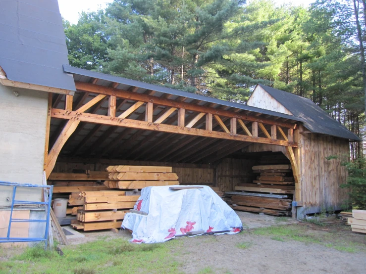 an image of a home covered by construction materials