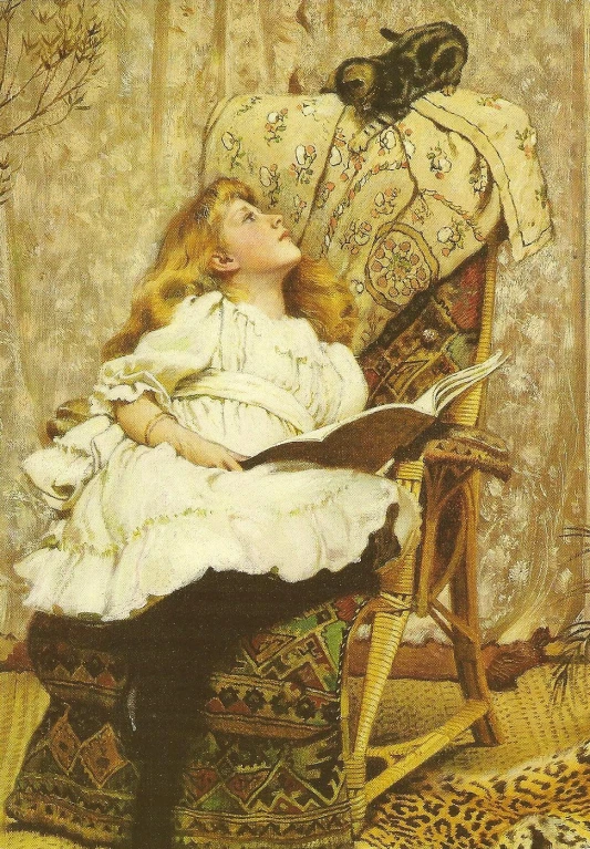the child is seated and reading in an ornate chair