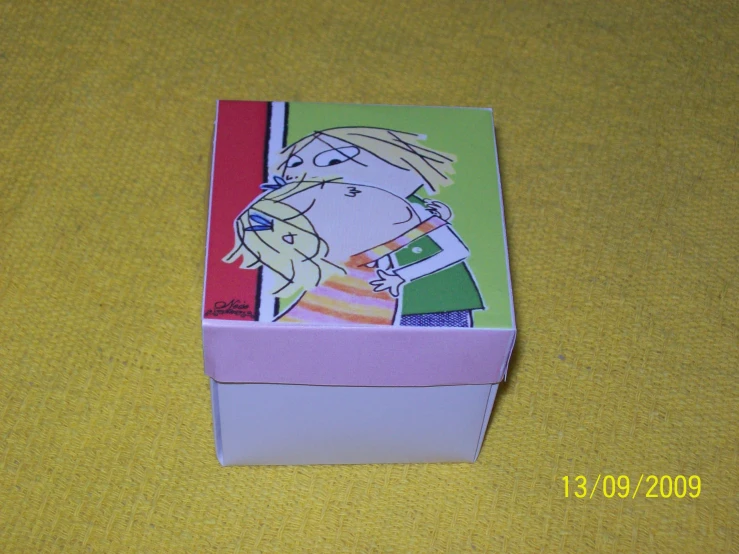 the box has a drawing of a woman on it