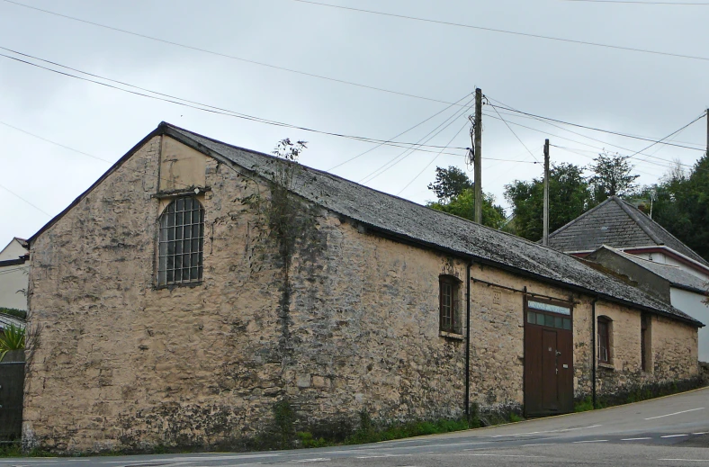 an old church is shown on the corner