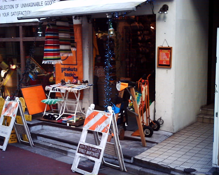 this is an image of a street corner with clothes and decorations