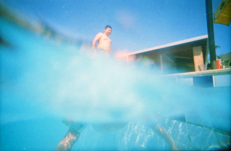 a man on a surfboard rides on the waves