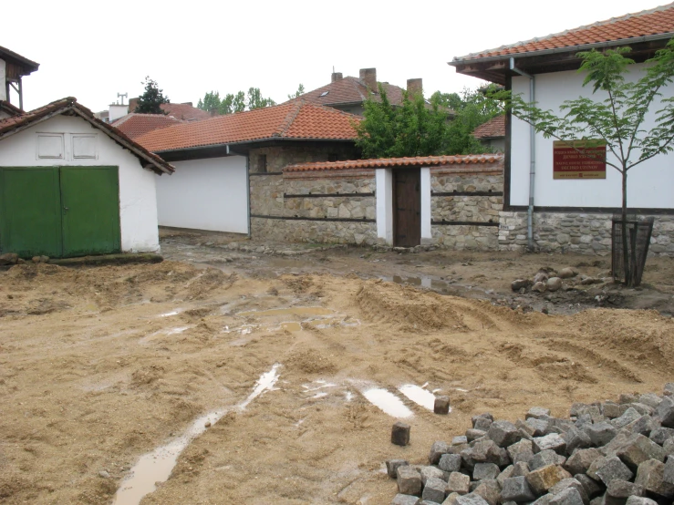 an abandoned building with a lot of rubble around it