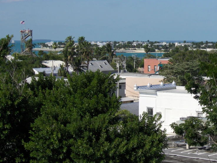 a view from a high building of some buildings and trees