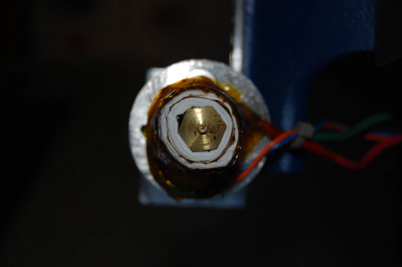 an object with a solder wrapped around it with wires
