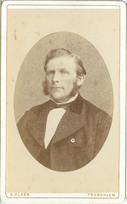 an old black and white pograph of a man