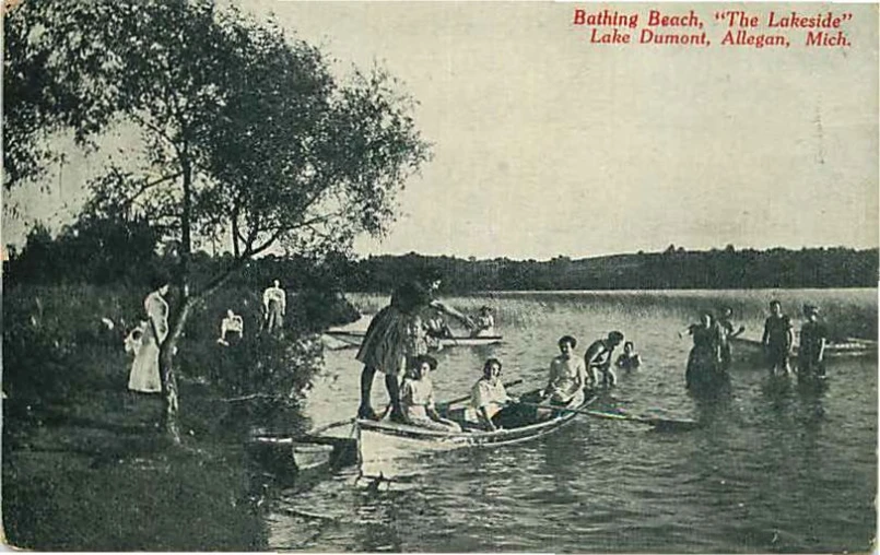 old black and white po of a person in a canoe in a lake