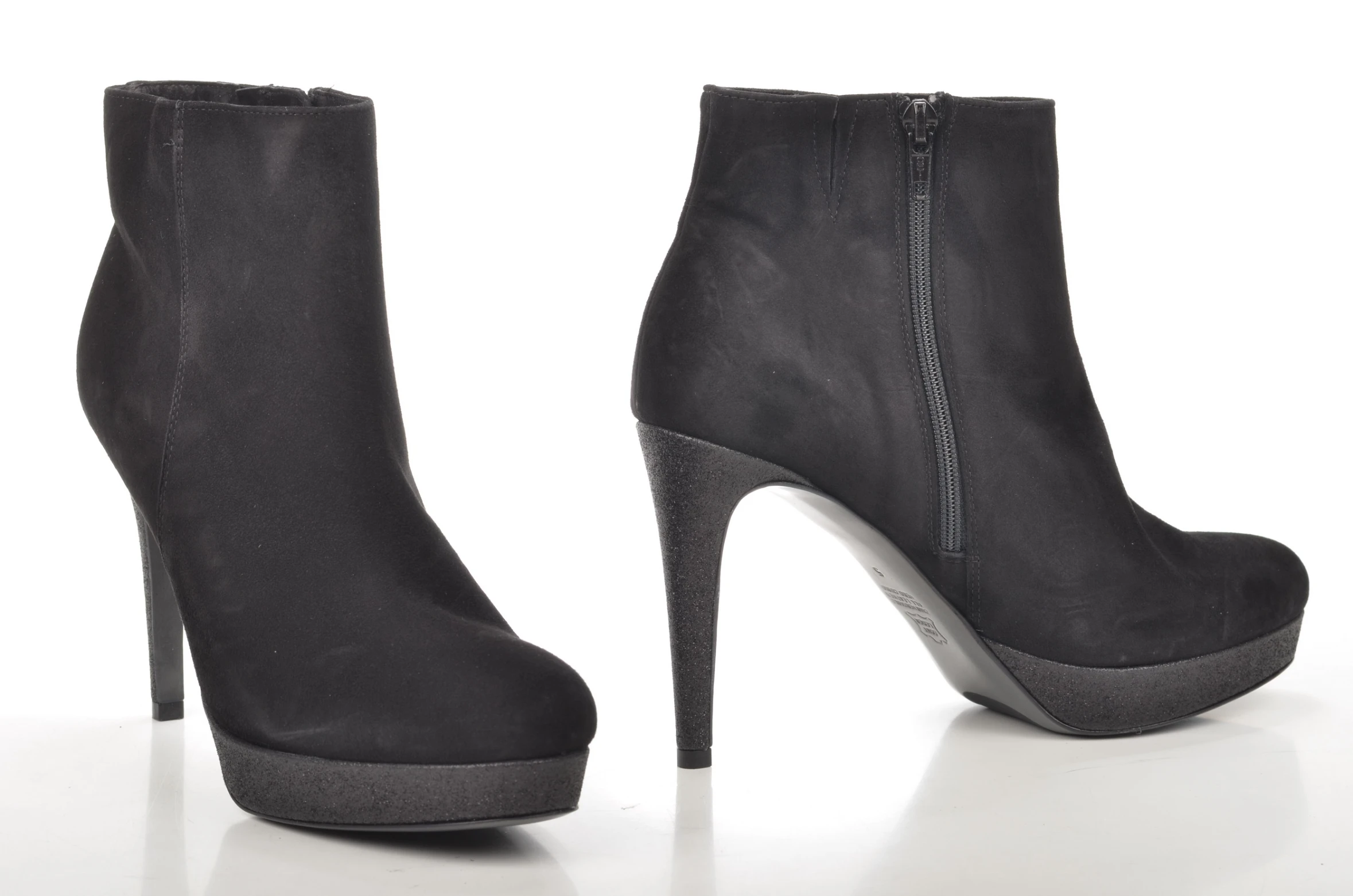 high heeled black boots with zippers