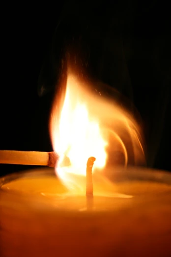a fire in the middle of a candle
