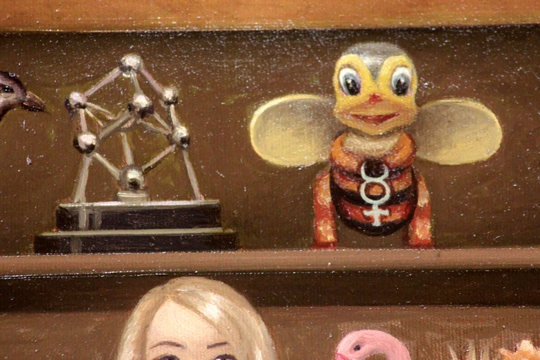 a doll and toy figures on a shelf