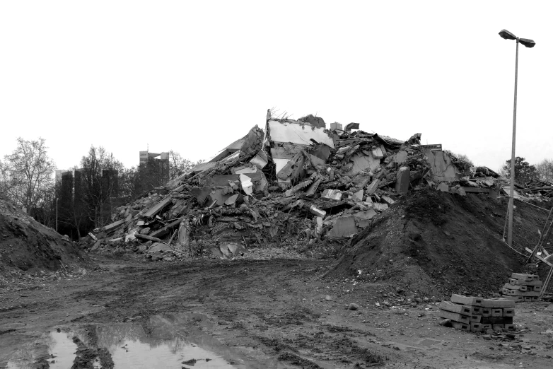 the debris has fallen and is piled on top of the building