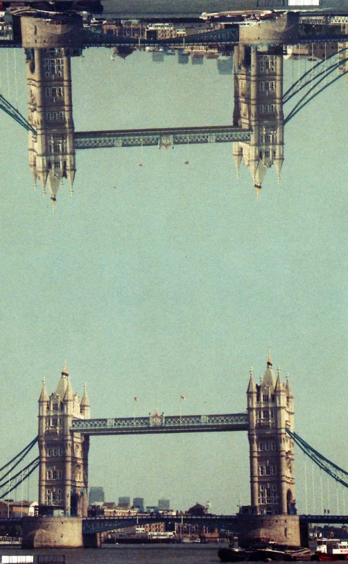 three s frames show the bridge with water