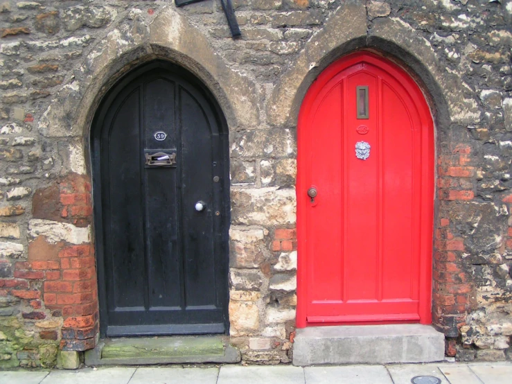 two doorways on the brick walls side by side