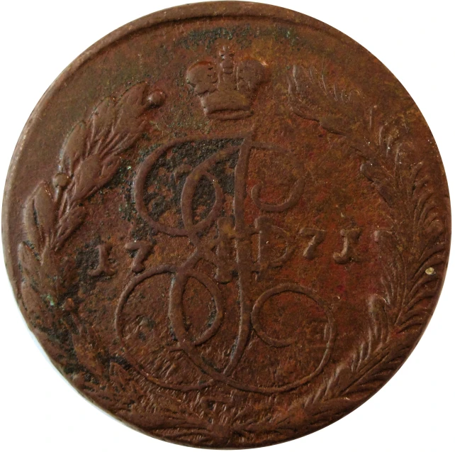 an old iron coin with designs