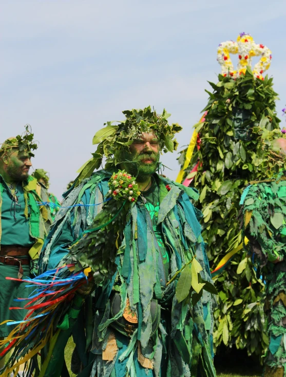 group of people dressed as people with green clothing on