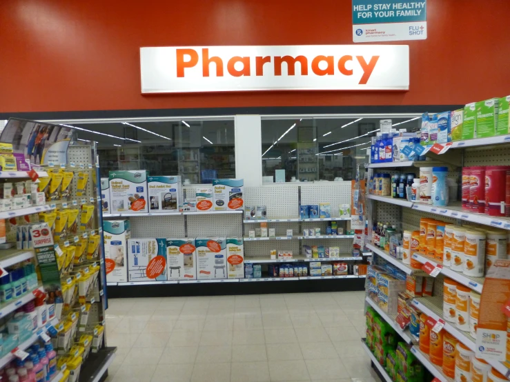 an pharmacy store with its shelves packed with toiletries