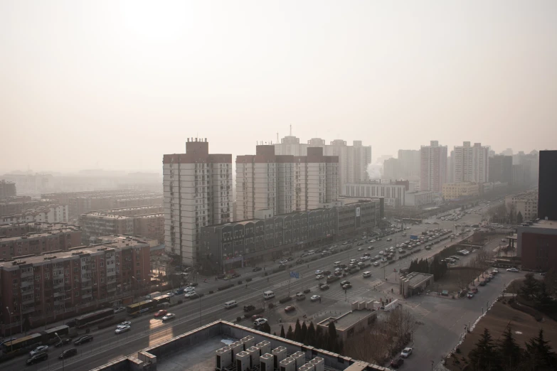 a large city is filled with traffic and high rise buildings