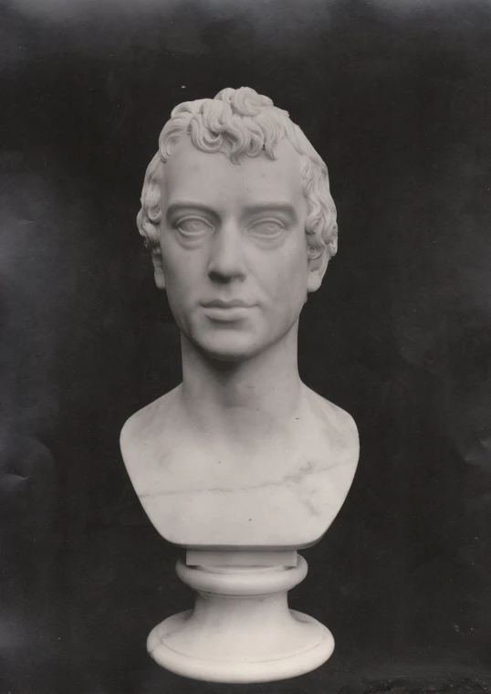 a bust of a man is shown in an old black and white po