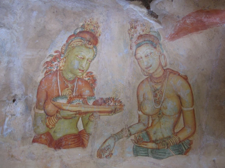 an artistic painting of two indian ladies with cake