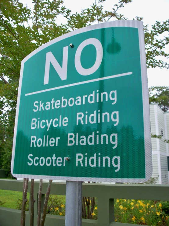 there is a road sign warning that cyclists are not riding