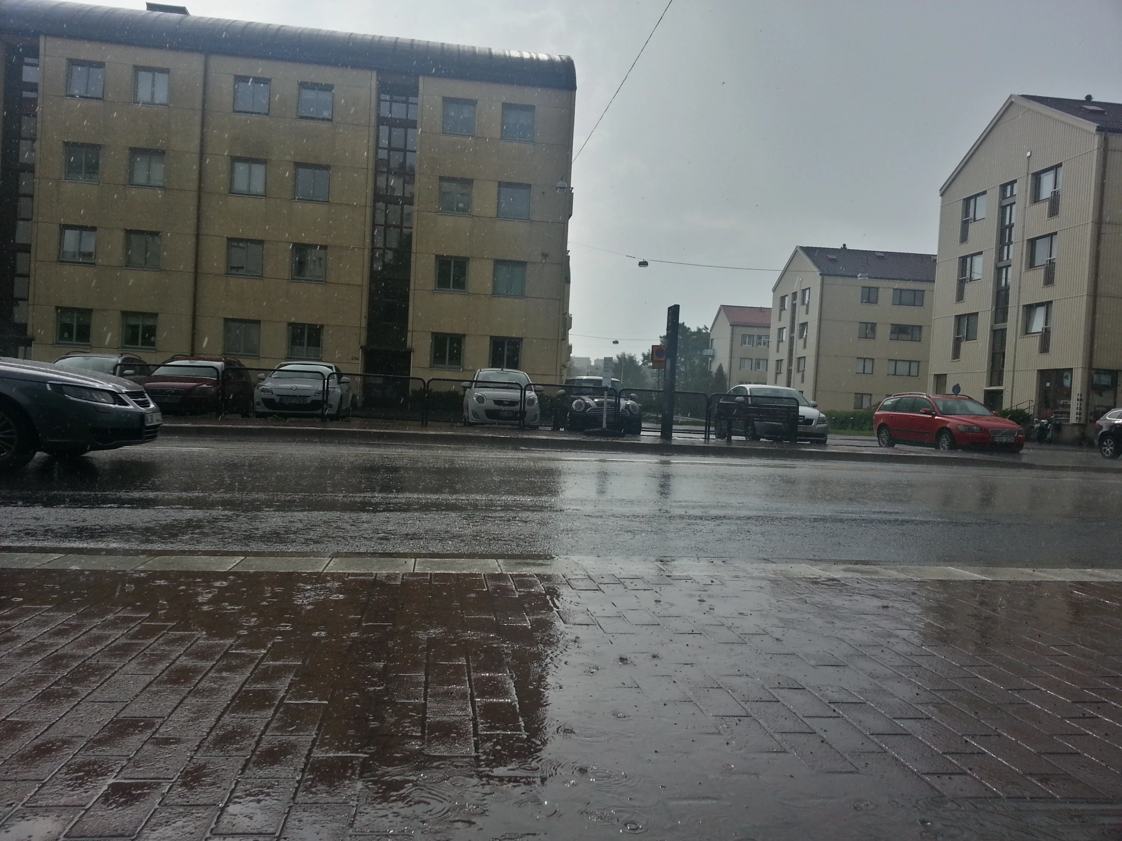 a car that is sitting in the rain