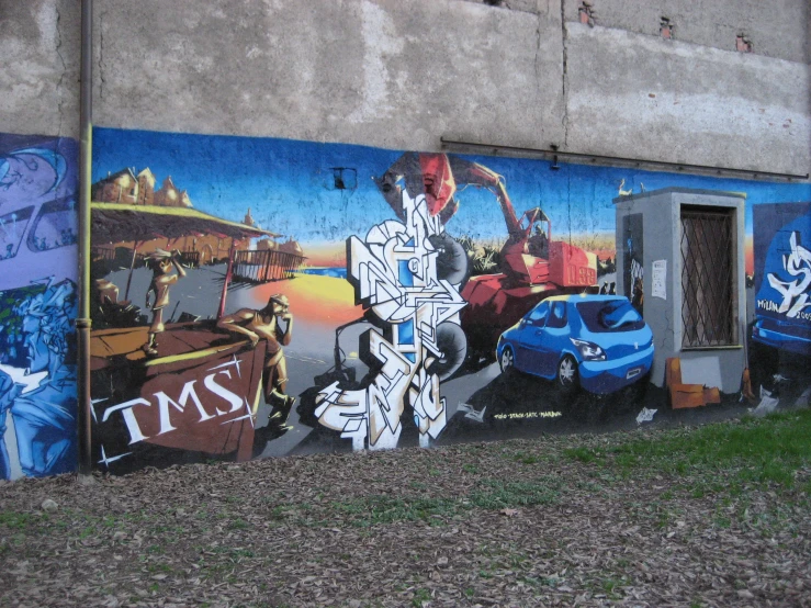 a painted wall of various people and cars