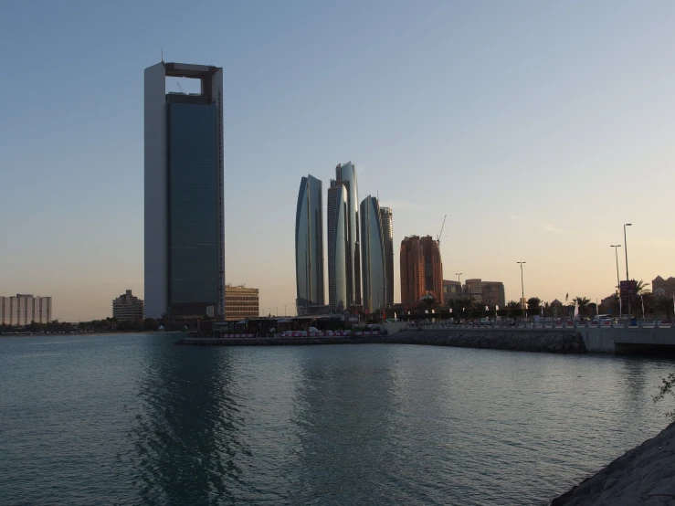 some buildings are by the water and a building