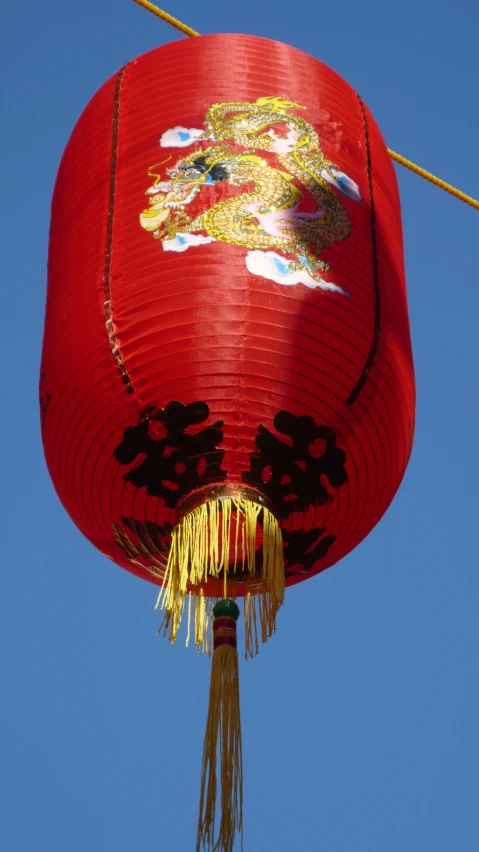 oriental paper lanterns with blue sky in the background
