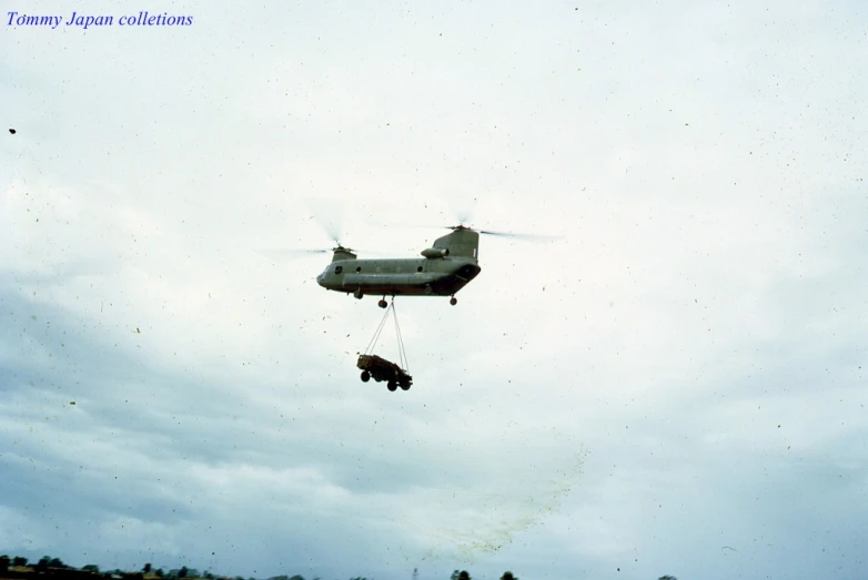 two soldiers are jumping from an airplane into the air