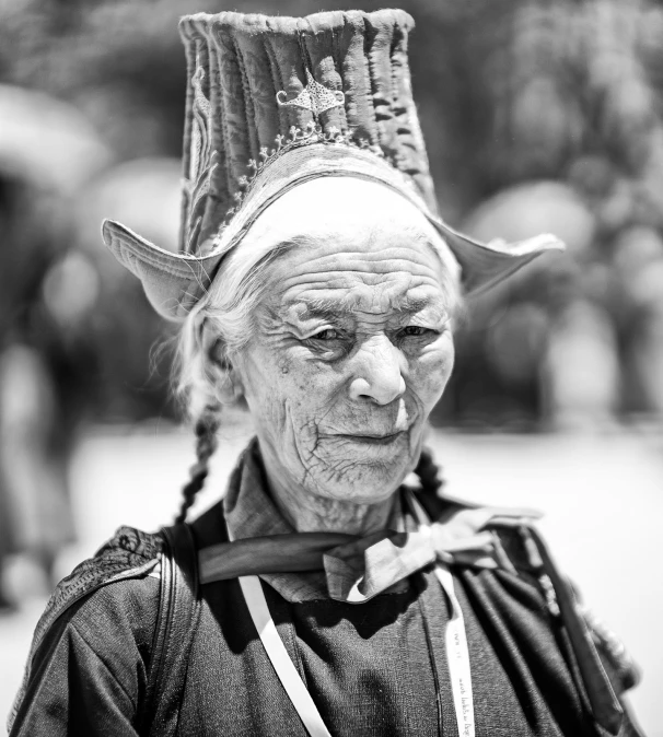 an older woman with a horned crown on her head