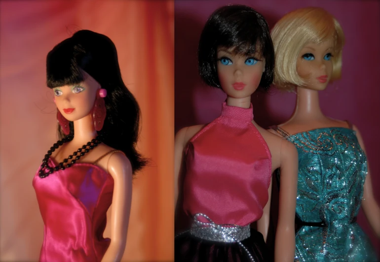 two barbie dolls are wearing dresses with pearls
