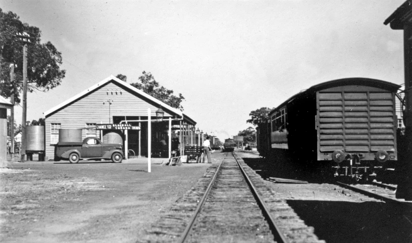 a train on the tracks at a station