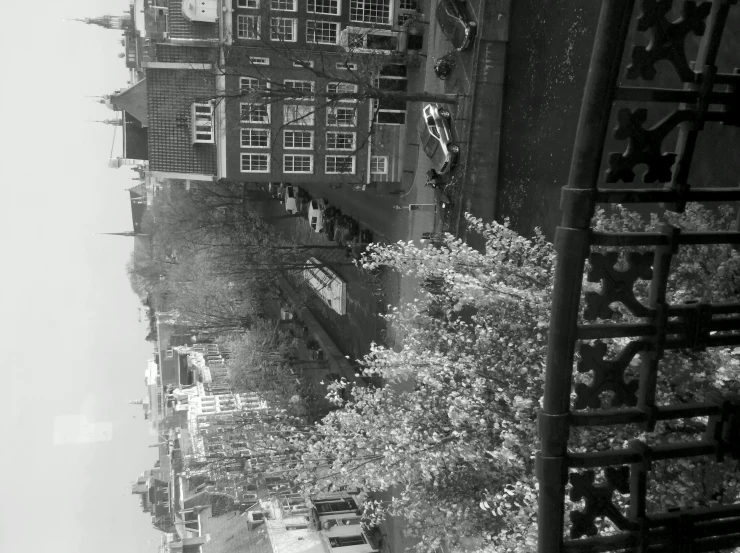 a view from a balcony looking down on a street