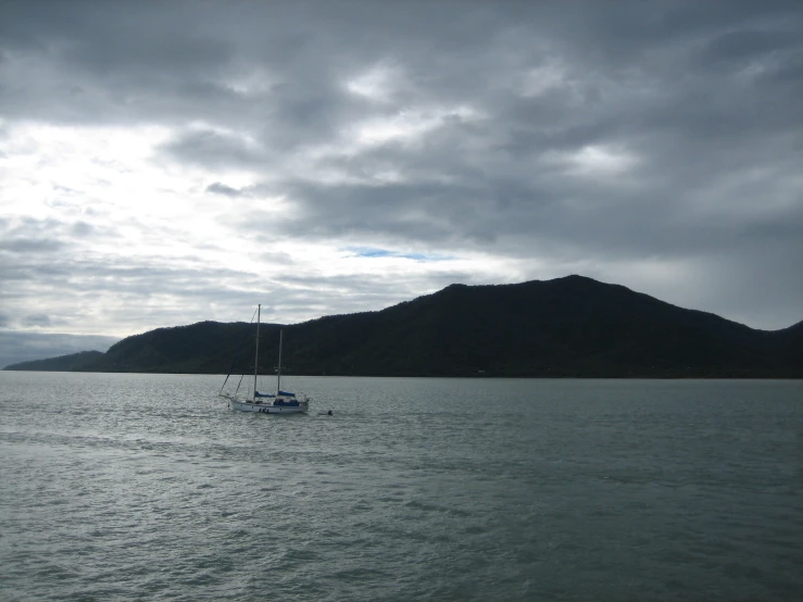 a sail boat that is out on the water