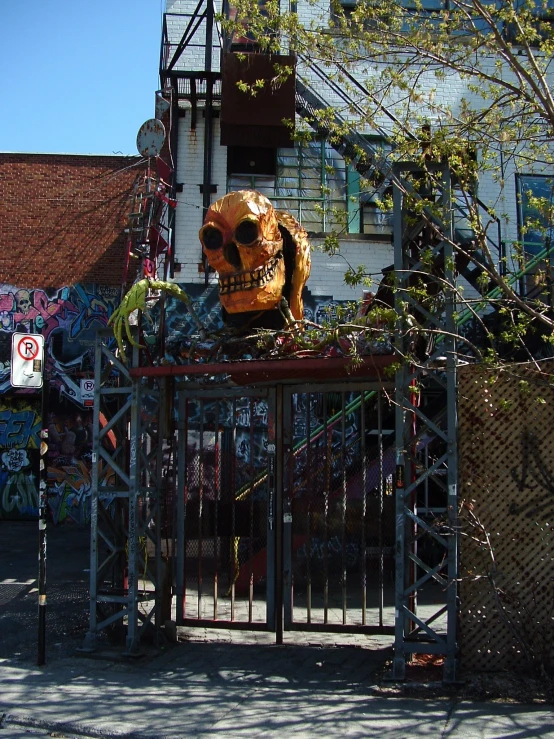 an image of a creepy face above some fencing