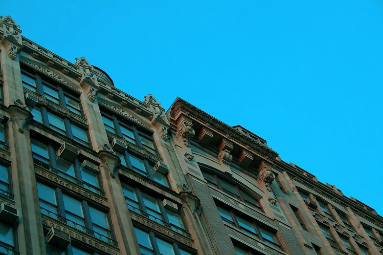 a building that has some windows in front of it