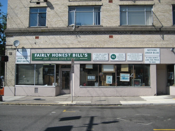 an empty commercial bank building with signs for their bills