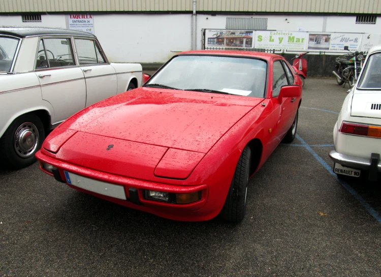 a close up view of a red and white sports car