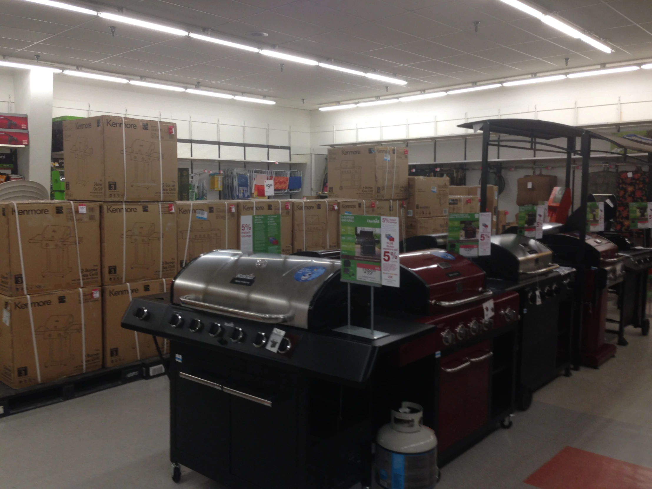 shelves and shelves lined up with items in a warehouse